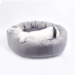 Round Pet Bed: Warm and fluffy fabric for nest body